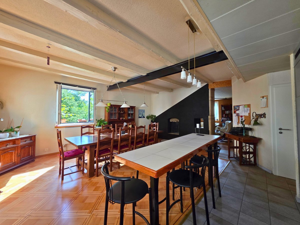 Appartement 5.5 pièces de caractère aux volumes généreux au Locle en vente chez Apache Immobilier
